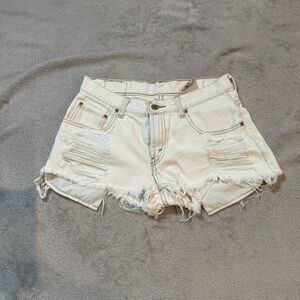 Levi’s Distressed White Denim Shorts Size 27